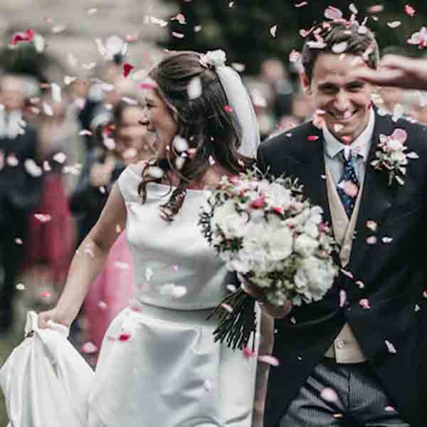 A UK bride wearing a Britten bespoke wedding veil